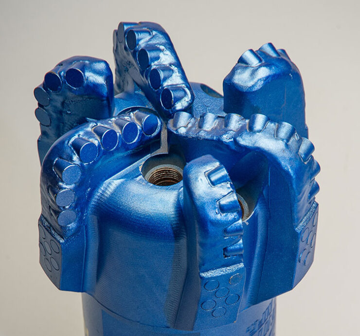 Blue PDC drill bit with polycrystalline diamond cutters