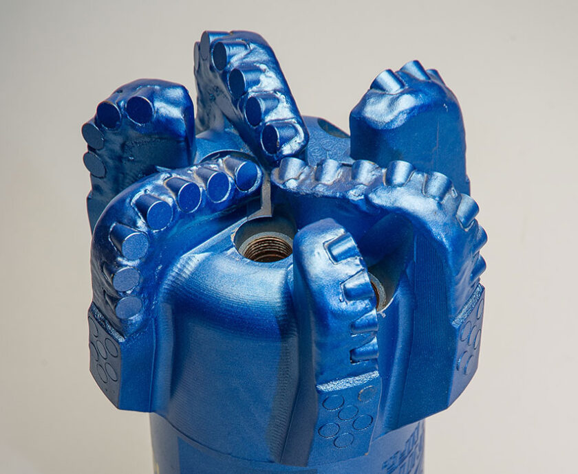 Blue PDC drill bit with polycrystalline diamond cutters