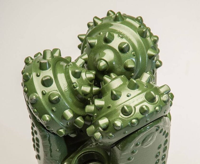 Green tricone drill bit with tungsten carbide insert cutters