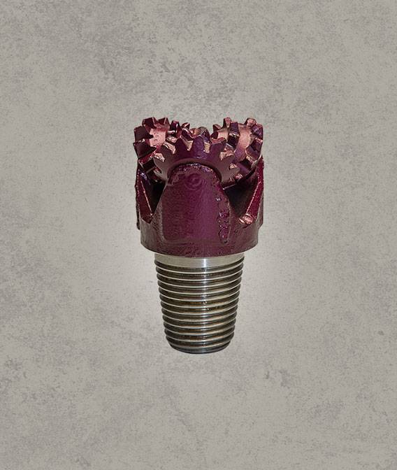 Mill tooth tricone drill bit with open bearing and steel milled teeth.