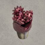 Mill tooth tricone drill bit with open bearing and steel milled teeth.