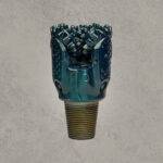 Front view of mill tooth tricone drill bit with sealed bearing and steel milled teeth.