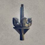 Tricone hole opener with multiple tungsten carbide insert cutters for rock drilling